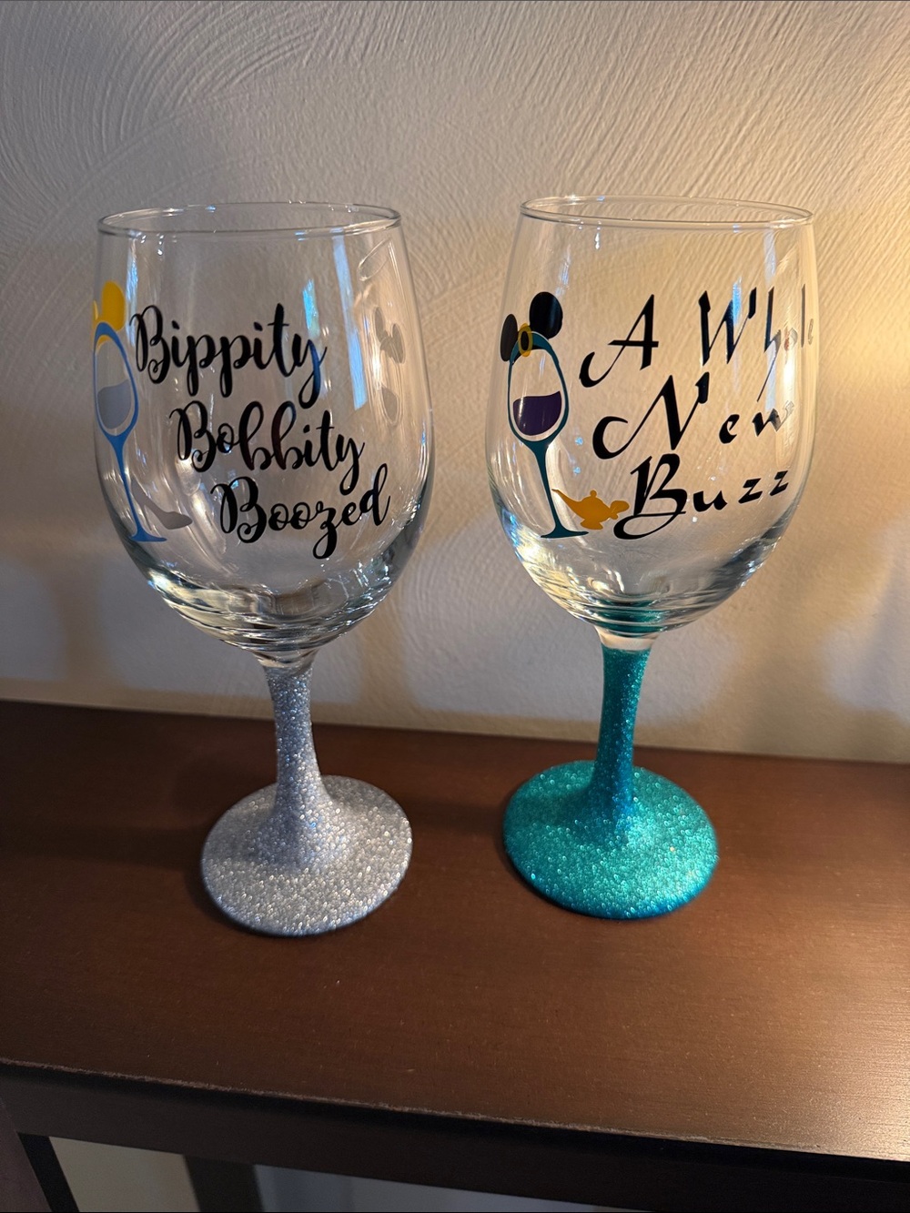 Set of 2 Disney themed hand painted wine glasses. Brand new never used